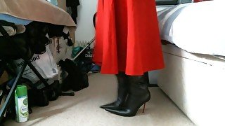 Red midi skirt and pointed italian thigh high boots