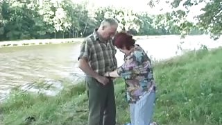 Older Couple on the river bank