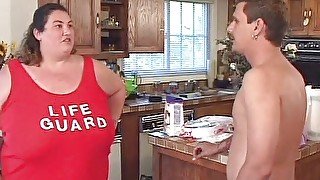 Fat beach patrol vol1 - BBW lifeguard playing with food and cock in the kitchen