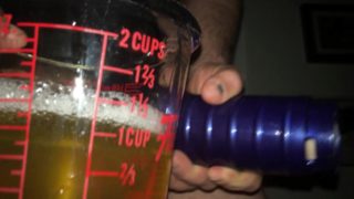 GOLD PISS IN A MEASURING CUP HD4K