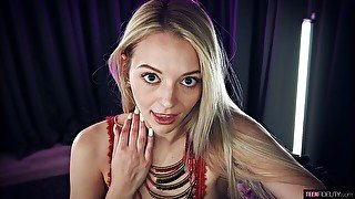 Cute-looking teen model Lily Larimar is sucking a big penis