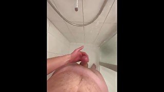 Hotel masturbation in the shower! Huge cumshot!