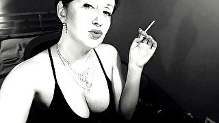 Smoking tease in classy outfit