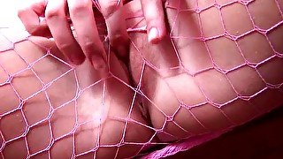 Pigtailed brunette fishnet pantyhose masturbation