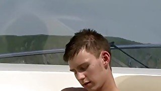 Twink loves wanking solo on a boat far from shore