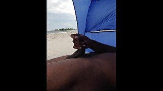 Masturbating on the beach