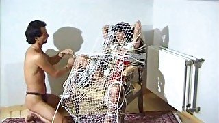 Milf Gets All Tied Up To A Chair With Her Titties Exposed