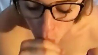 Petite Blonde Takes a Large Cumshot to her Sexy Glasses