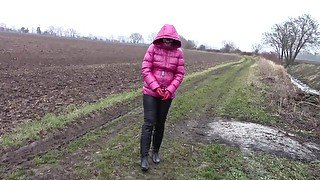 With handcuffs and shiny pink jacket