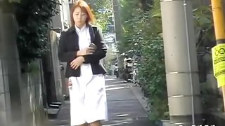 Skirt sharking of an attractive red haired Asian chick