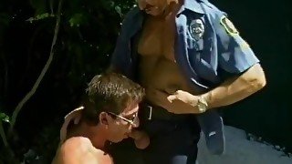 Two Lewd Cops Acquire A Guy On His Knees To Engulf 10-pounder