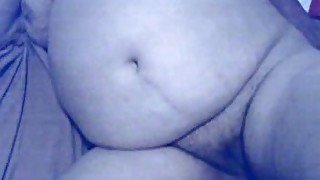 Chubby mature lady in her bed with a dick in her mouth