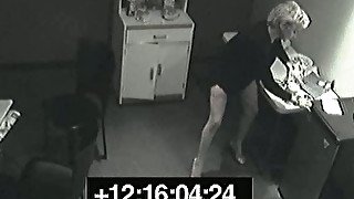 Blonde milf office lady masturbates on security cam