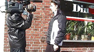 Young brunette interviewed on the street