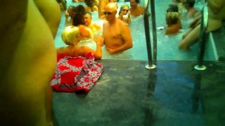 Voyeur finds stunning mature babes enjoying a nudist party