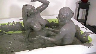 Big boobs lesbians in the mud