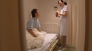 Japanese nurse plays with some dude's cock before jumping on it