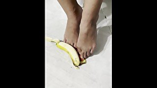 Cute tiny feet stroke, peel and crush a banana - MandySnow free clip