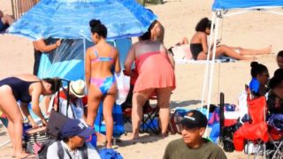 Beach voyeur spying on sexy amateur babes in tight bikinis