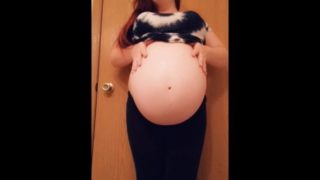 Tiny mama gives a sneak peak of her unborn while baby daddy showers