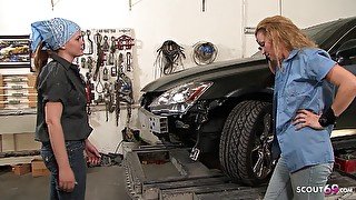 Horny lesbian sex in the garage with blonde Milf